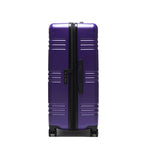 STRAHYD MAX - Maleta Expandible, Check-In L, color morado, vista lateral, ruedas Spinner 360° Hinomoto Silent-Run, candado TSA